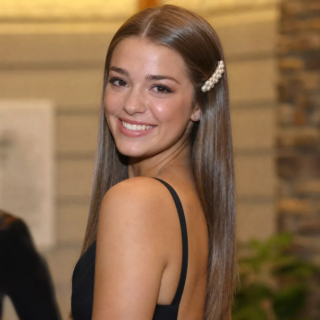 25 Homecoming Hairstyles That Are Actually Easy to Recreate 19 Sleek Straight with Accessory
