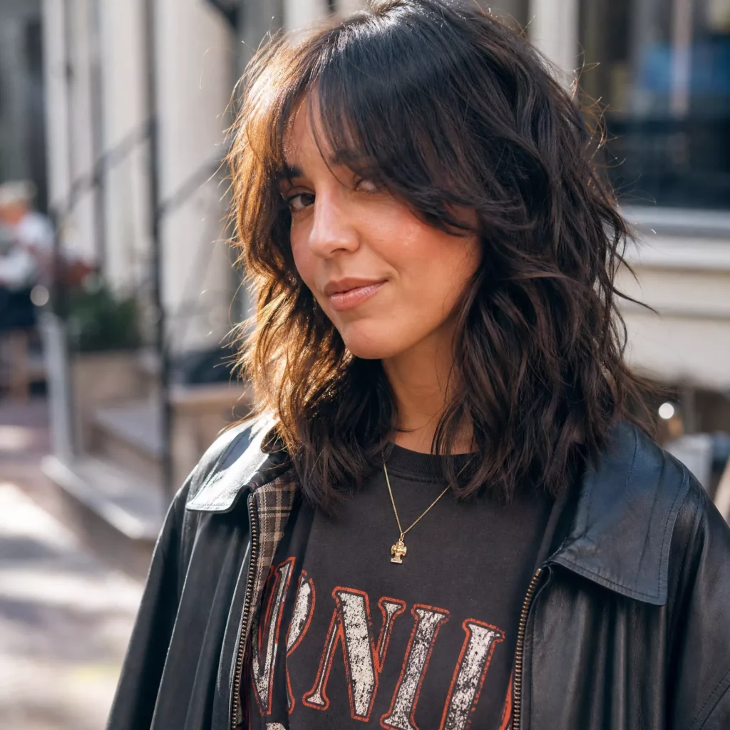 23 SHOULDER LENGTH SHAG WITH CURTAIN BANGS