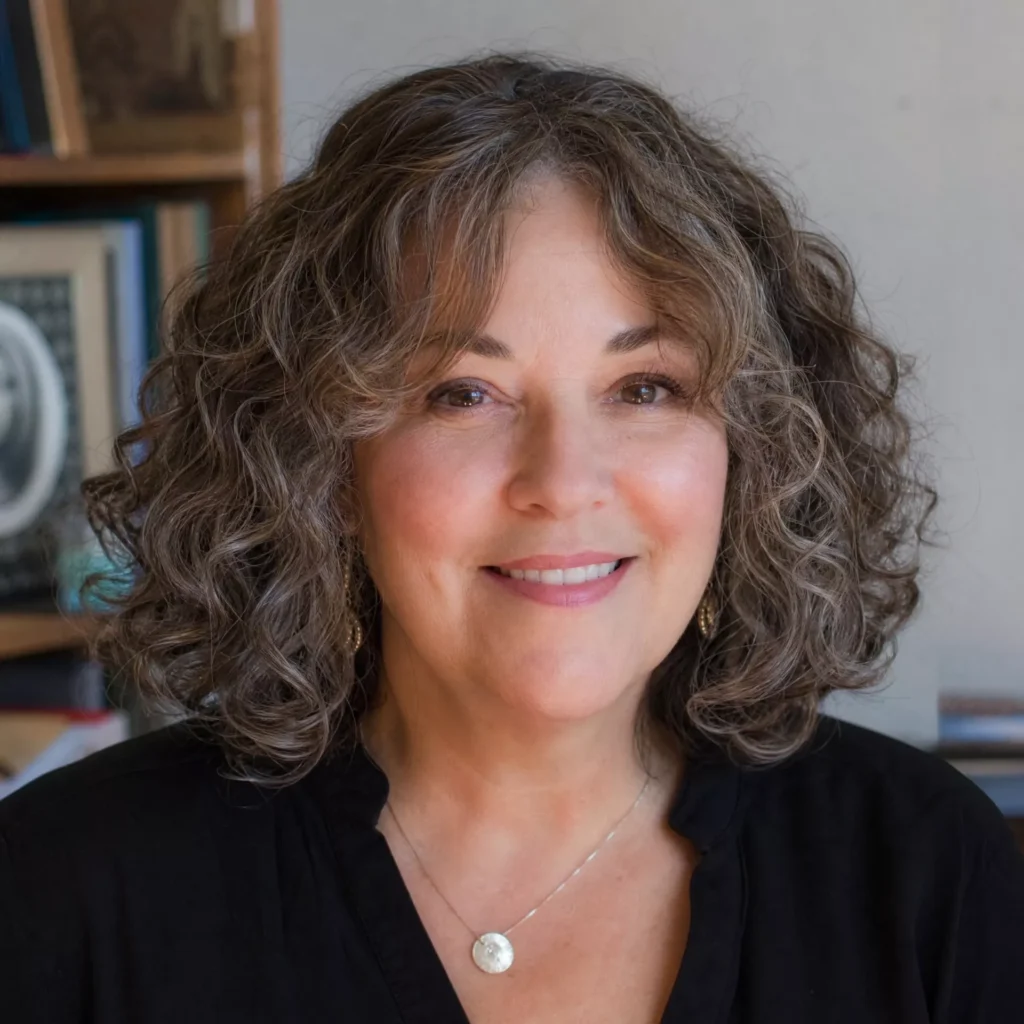 20 Curly Lob Hairstyles for Women Over 50 with Round Faces 4 Curly Lob and Curtain Bangs